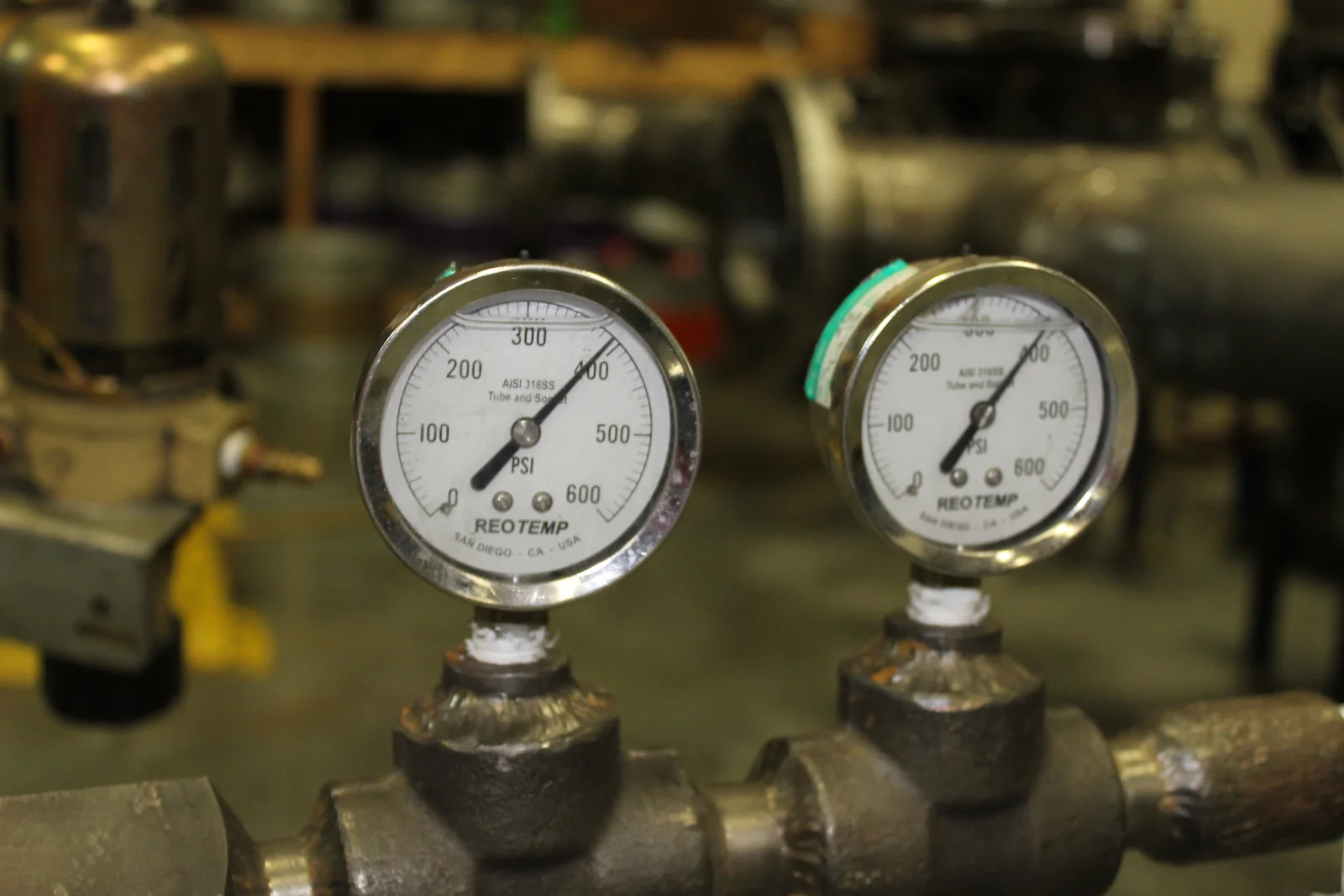 Pressure gauges on a strainer impulse manifold — differential pressure instrumentation